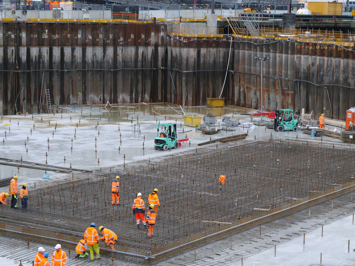 A large building site with workers in hi-vis